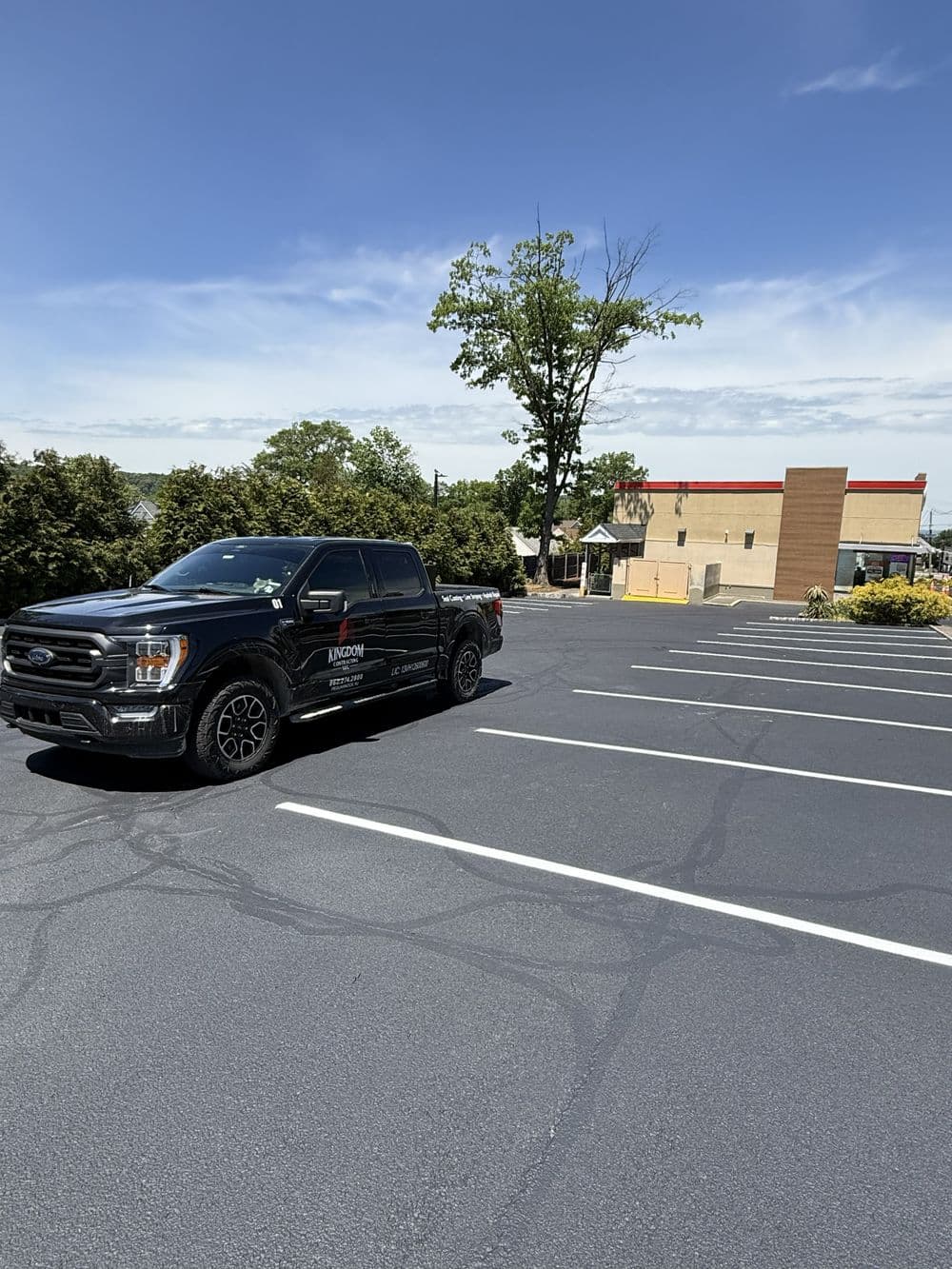 Phase 2 of Commercial Parking Lot Sealcoating, Patching, Crack Filling and Line Striping in Cedar Grove NJ image