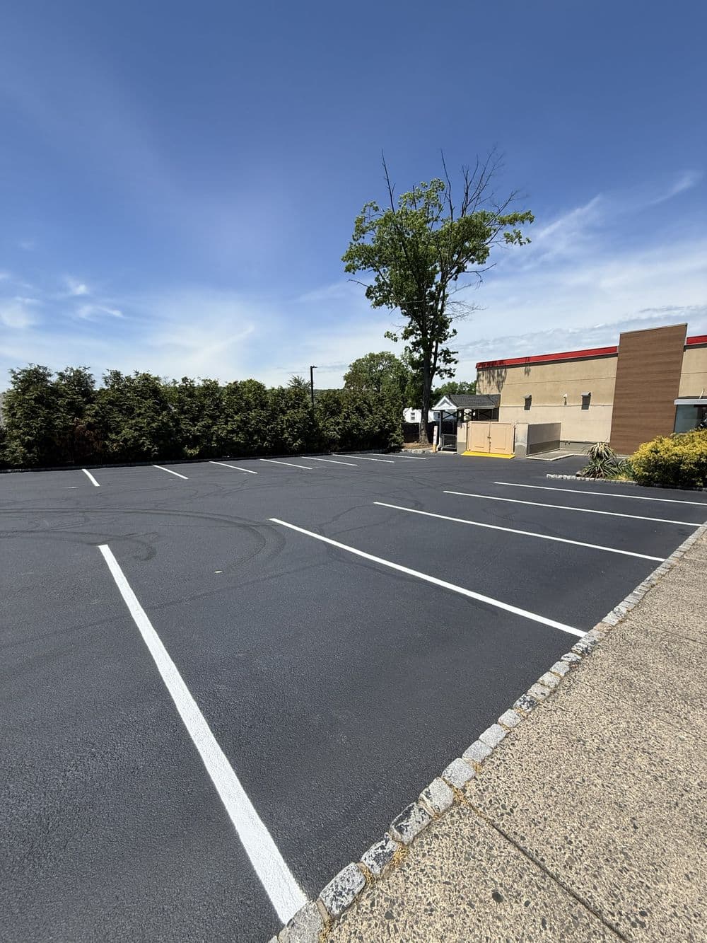 Gallery photos for Phase 2 of Commercial Parking Lot Sealcoating, Patching, Crack Filling and Line Striping in Cedar Grove NJ: Image #2