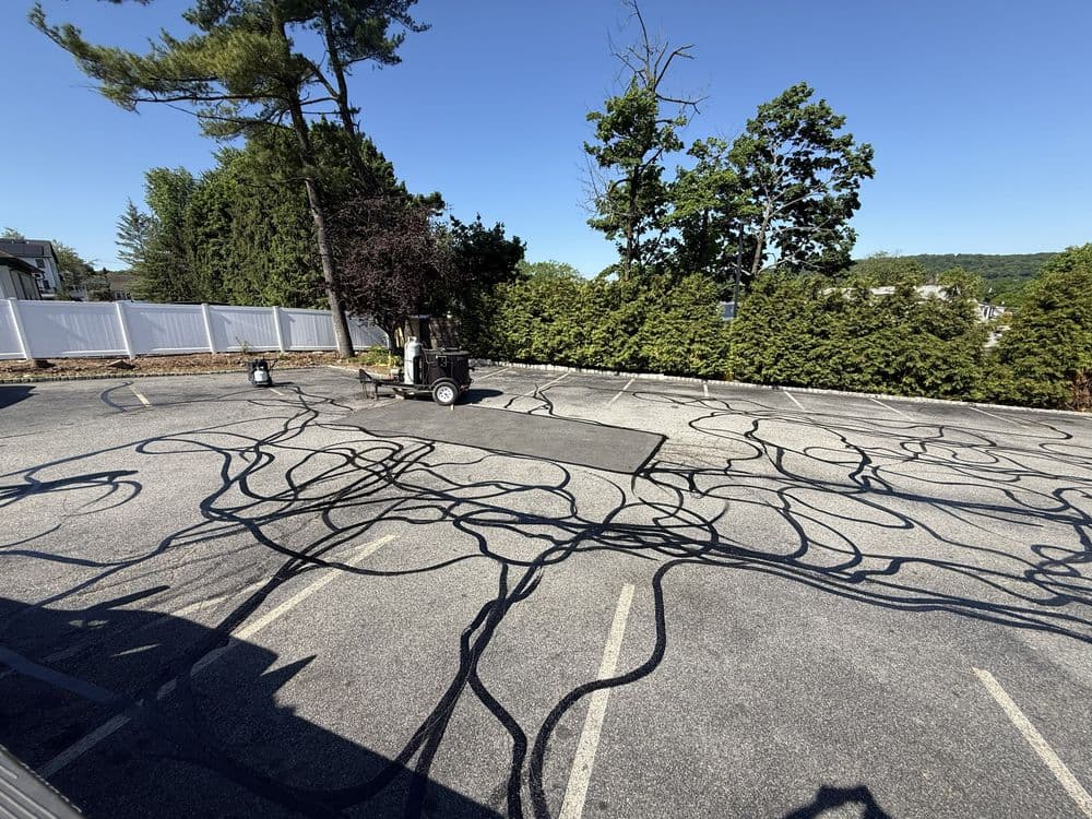 Gallery photos for Phase 2 of Commercial Parking Lot Sealcoating, Patching, Crack Filling and Line Striping in Cedar Grove NJ: Image #3