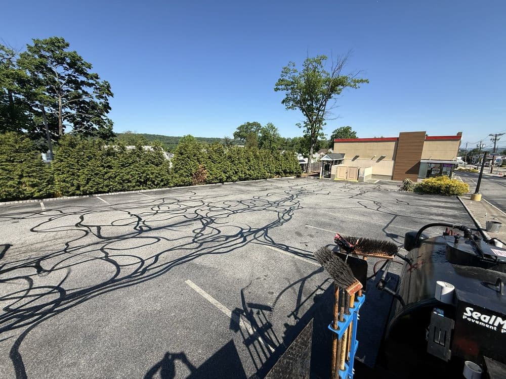 Gallery photos for Phase 2 of Commercial Parking Lot Sealcoating, Patching, Crack Filling and Line Striping in Cedar Grove NJ: Image #4